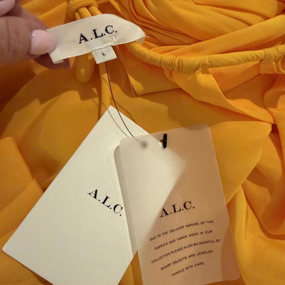 A.L.C. Meredith Pleated Sleeveless Dress in a vibrant mango yellow color - Picture 5 of 6